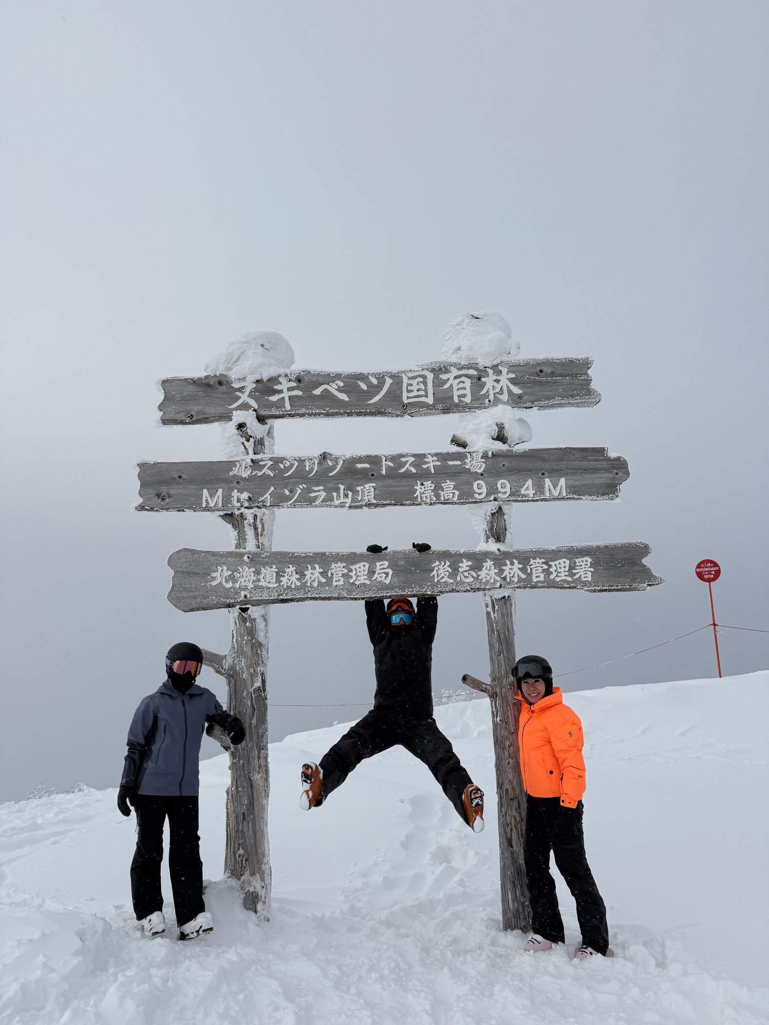 Ash Johns and ski guests at the summit of Rusutsu