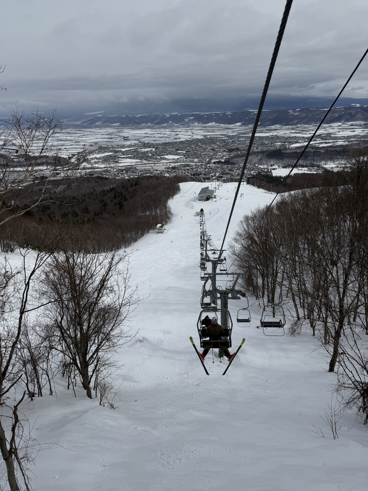Chairlift and ski slopes overlooking Furano